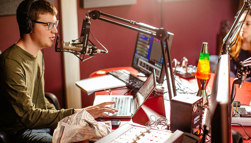 Elijah Wilhelm works on the campus radio show, WRKE
